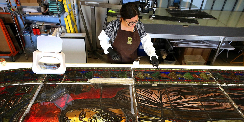 French artisans restore Notre-Dame stained glass windows soiled in fire