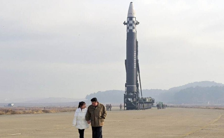 North Korea’s Kim presents missile, daughter in a bid to strengthen leadership