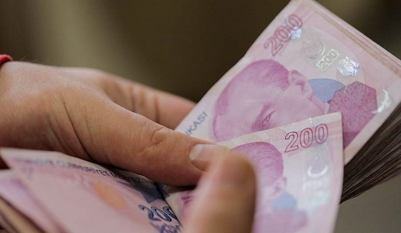 Turkish lira slips, stocks, bonds gain after Simsek appointment