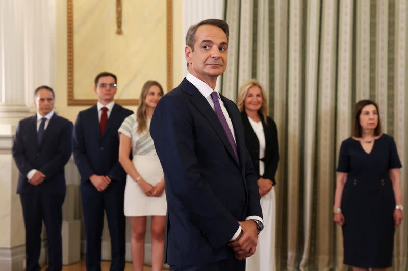 Mitsotakis sworn in as Greek PM, promises more jobs and 'big changes'