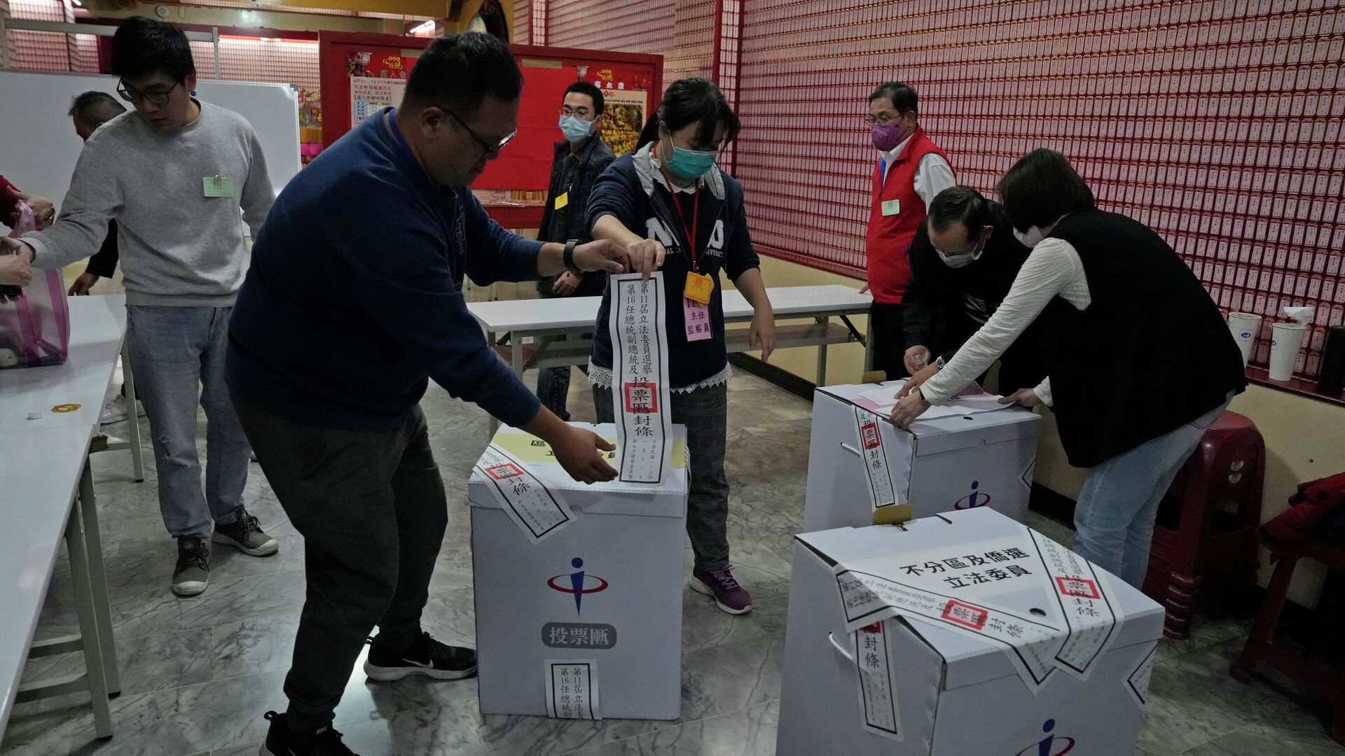 Polls open in Taiwan's critical elections watched closely by China