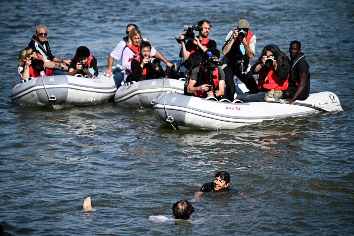Paris mayor Hidalgo bathes in the Seine to dispel water quality woes