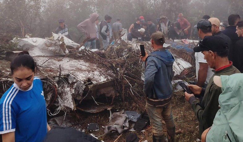 Rescuers search wreckage at site of Colombia plane crash